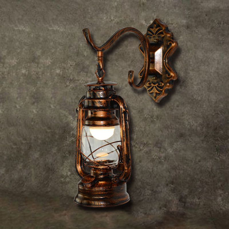 Coastal Living Room Wall Sconce - Clear Glass Light In Bronze Finish