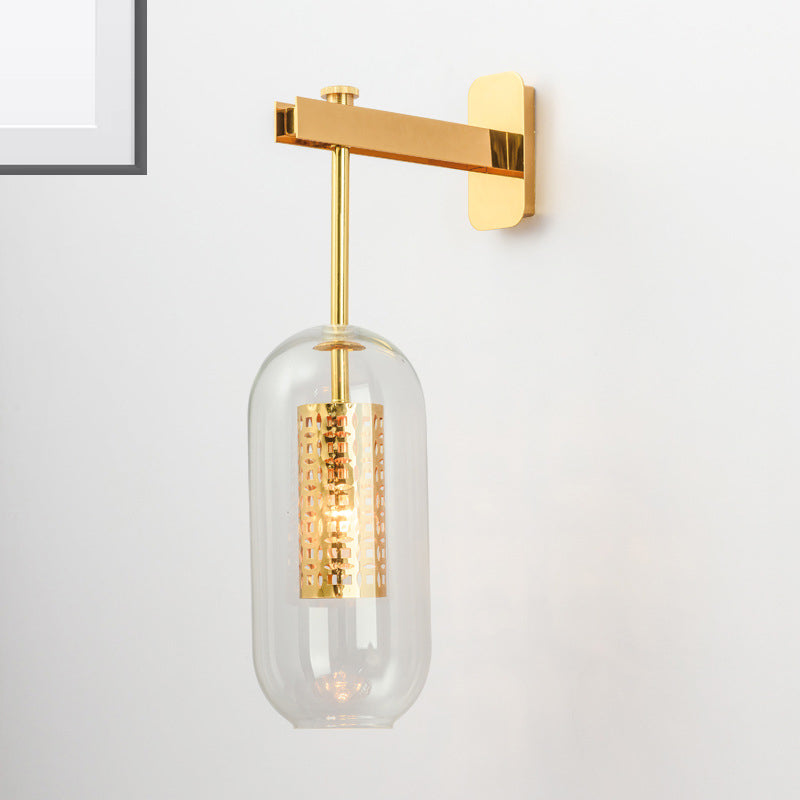 Modern 1-Light Clear Glass Tube Sconce - Brass Bedroom Wall Mount Lamp