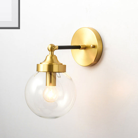 Simplicity Adjustable Globe Sconce Light Brass Wall Mount Lamp - 1 Bulb With Transparent Glass Shade