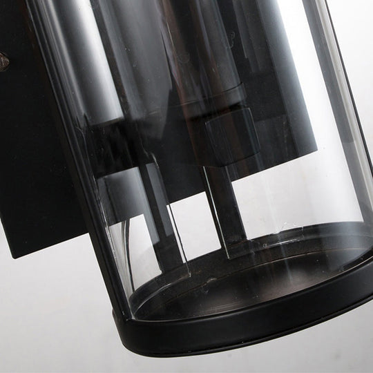 Modern Black Wall Sconce With Clear Cylindrical Glass Bulb Mounted Lamp