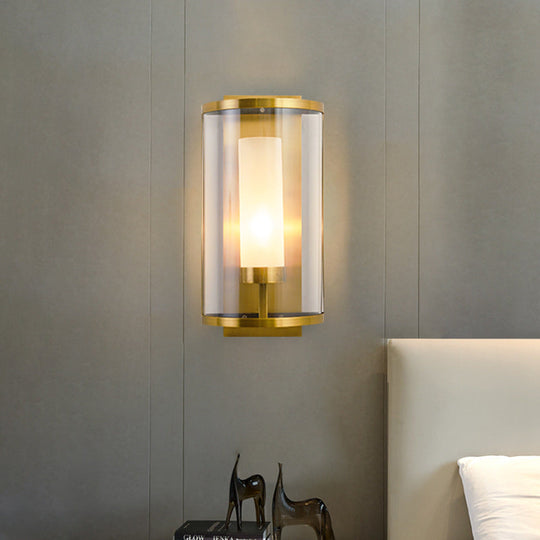Contemporary Gold Wall Sconce With Clear Glass Shade
