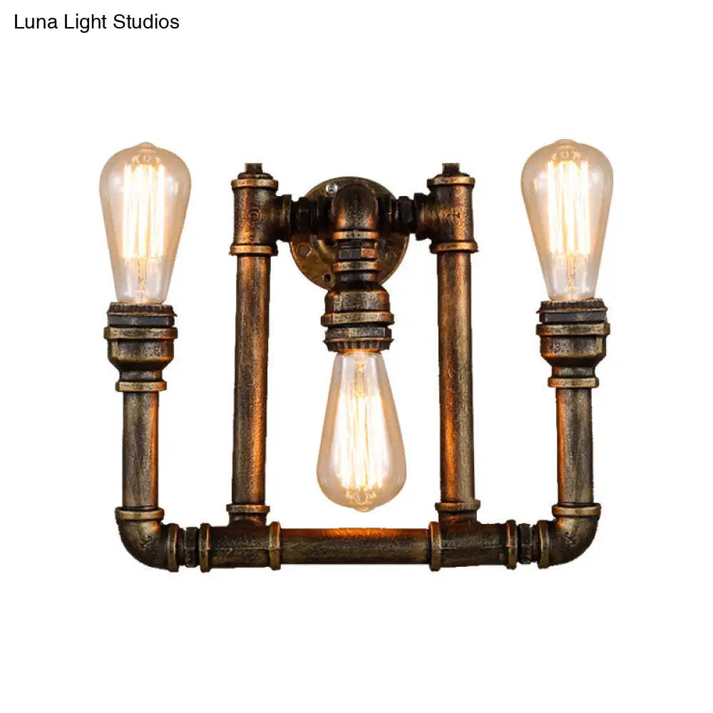 3-Head Industrial Sconce With Wrought Iron Pipe Design In Aged Brass For Hallway