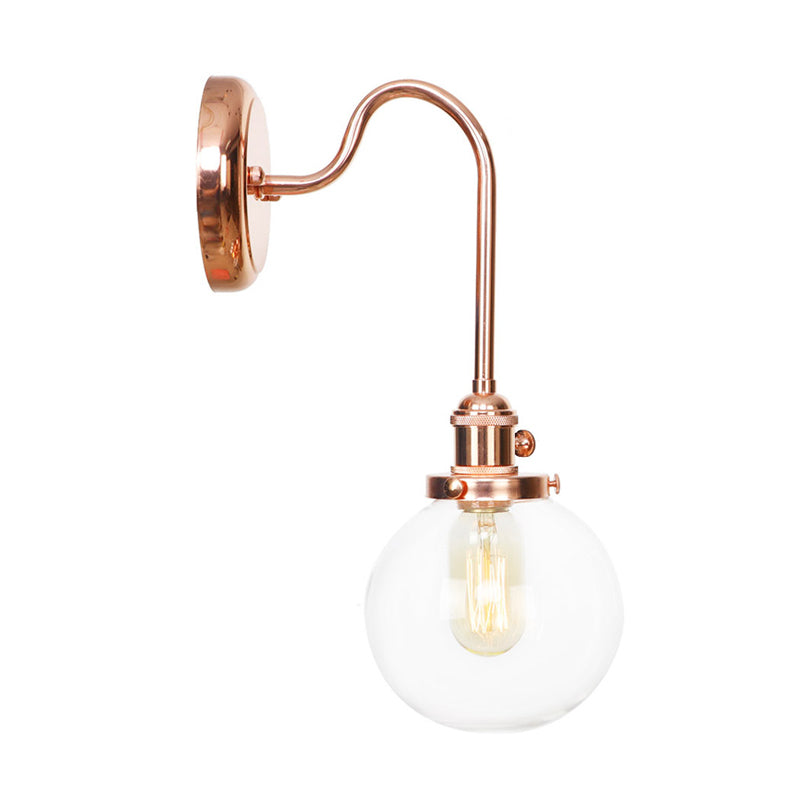 Copper Vintage Globe Wall Sconce With Curved Arm And Clear/Amber Glass - 1 Light