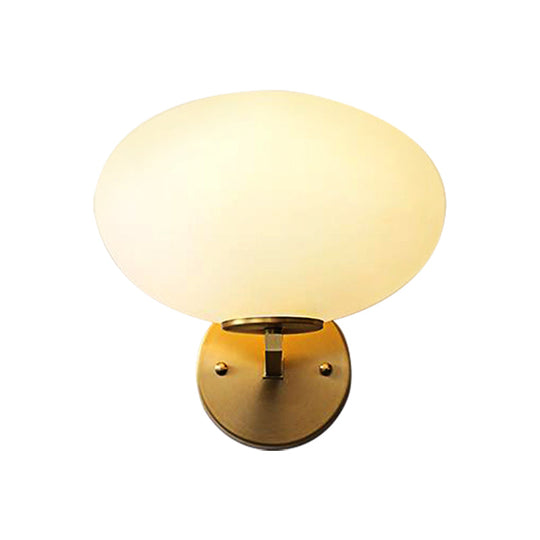 Modern Milk Glass Wall Sconce With Brass Finish