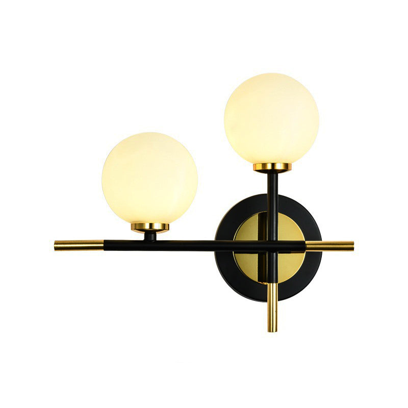 Modern Milk Glass Orb Sconce Wall Light - 2 Lights Black And Brass Cross Design