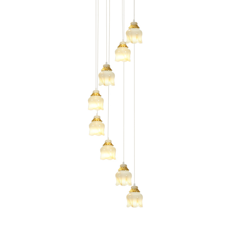 Modern 8-Light White Glass Floral Pendant Lamp with Gold Stair Hanging Design