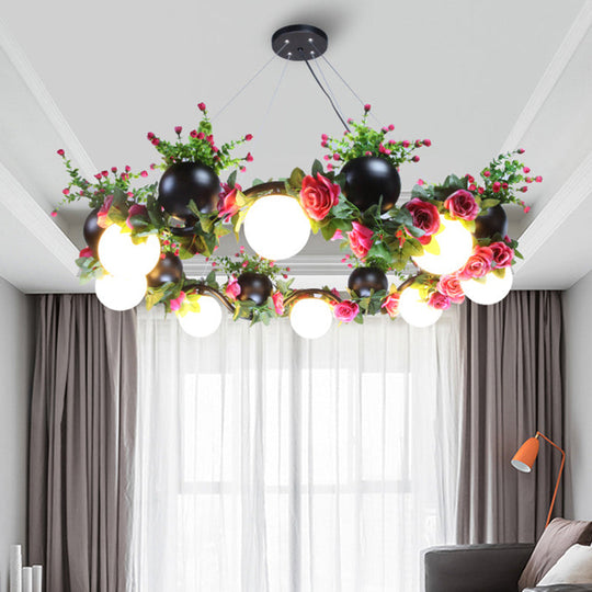 Industrial Metal Sphere Ceiling Lamp with Flower Decoration - 8 Bulbs, Black. Perfect for Living Room