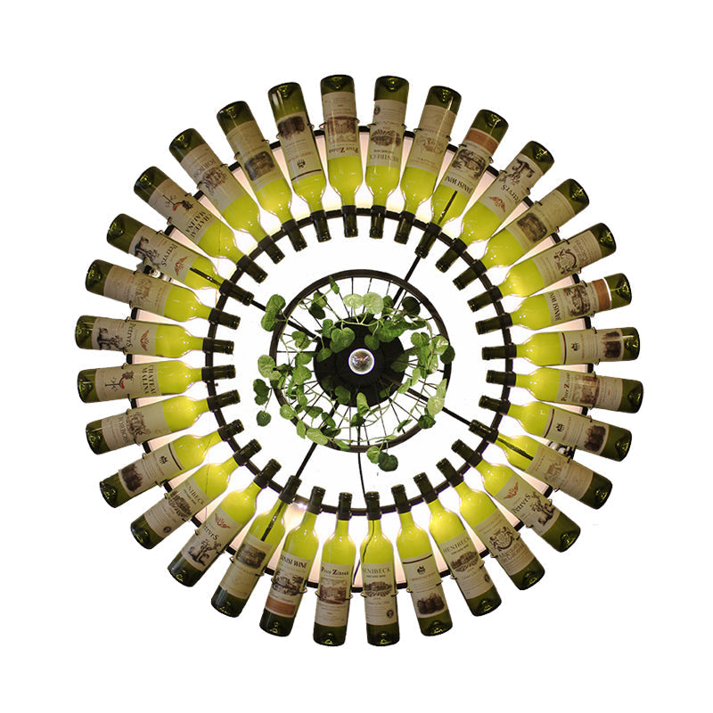 Industrial Led Wine Bottle Wall Sconce With Metal Fixture And Plant Accent In Black