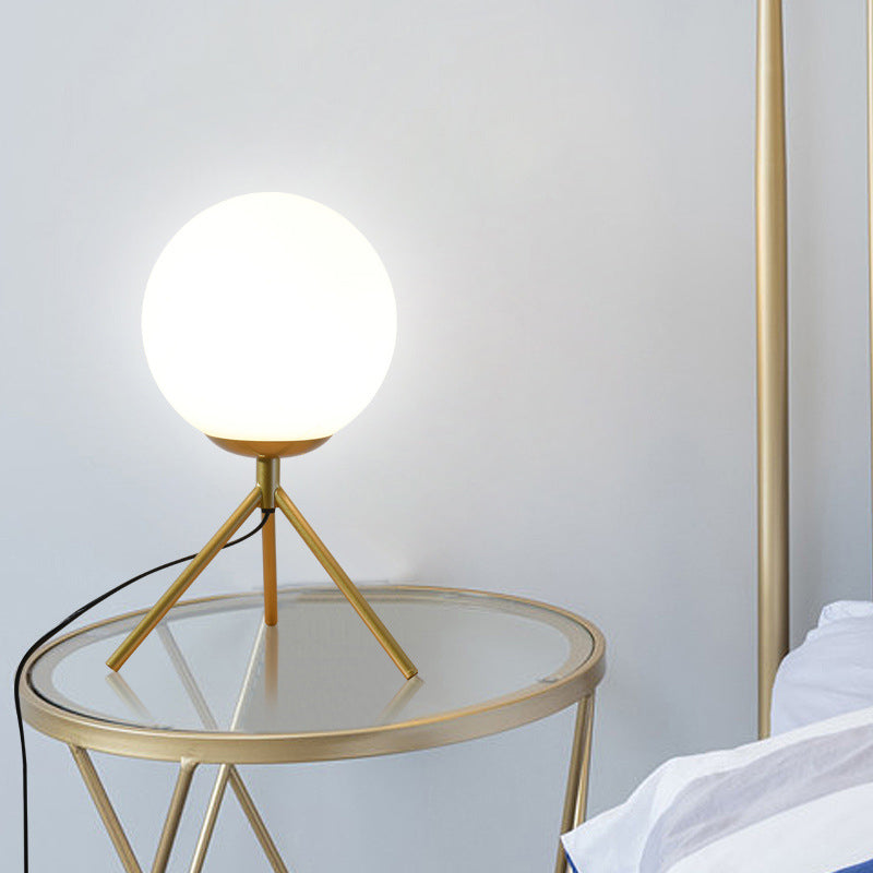 Modern Opal Glass Sphere Desk Lamp With Metal Tripod In Gold/Black