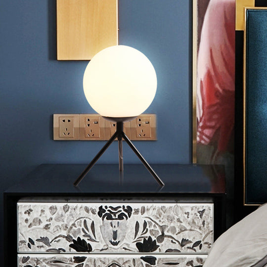 Modern Opal Glass Sphere Desk Lamp With Metal Tripod In Gold/Black