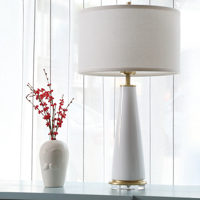 Modern White Fabric Cylinder Table Light With Cone Ceramic Base - 1 Bulb Desk Lamp