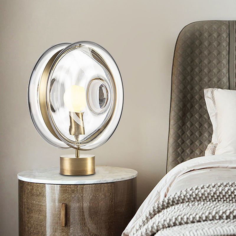 Minimalist Gold Metal Round Nightstand Lamp With Clear Glass Shade