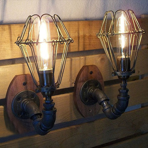 Rustic Wire Frame Wall Lighting With Stylish Pipe Design - 1 Light Wrought Iron Sconce In Black