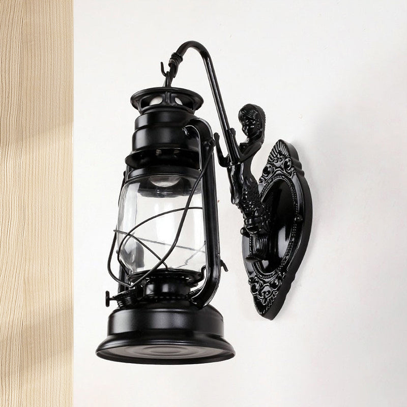 Coastal Bedroom Wall Light With Lantern Shade - Clear Glass Sconce In Black/Antique Brass/Weathered