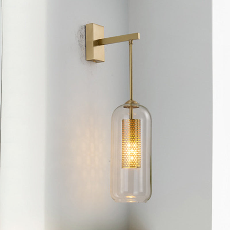 Modern 1-Head Gold Wall Mount Light For Bedside - Clear Glass Capsule Sconce Fixture