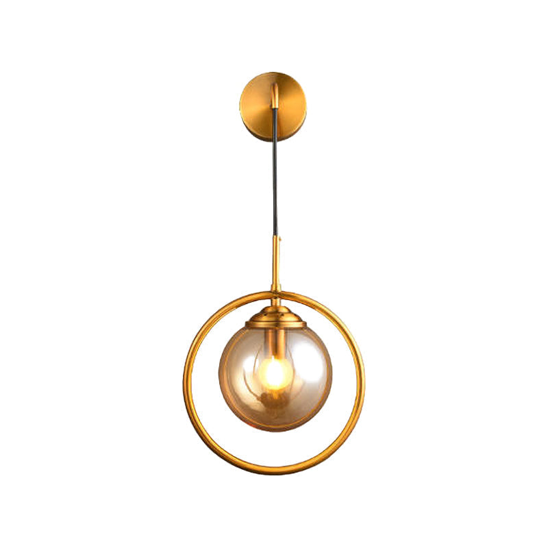 Modern Brass Wall Sconce With Glass Sphere Shade For Bedside Lighting