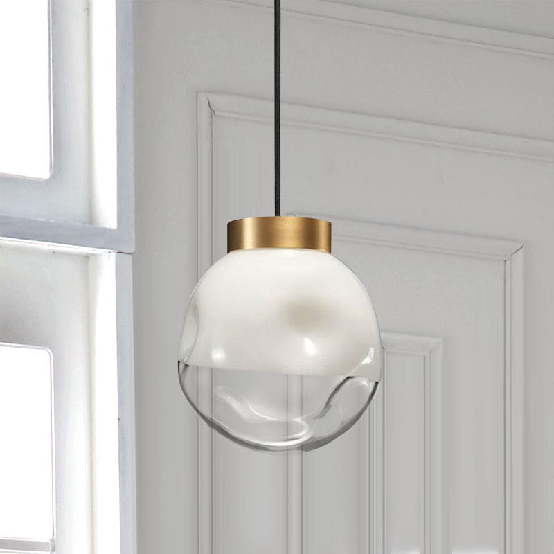 Modern Globe Pendant Light With Dimpled Glass In White And Clear Brass Finish