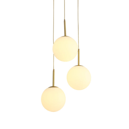 Modern White Glass Orb Hanging Ceiling Light With 3 Lights And Brass Finish
