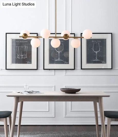 7-Light Modern Gold Metal Island Pendant With Spherical White Glass - Ideal For Dining Table