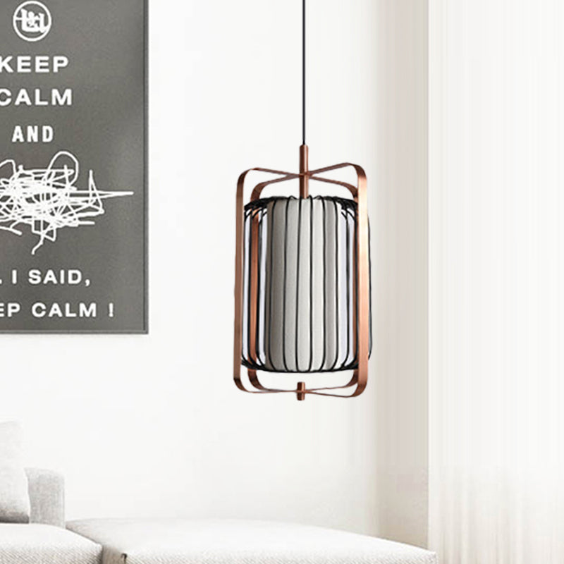Modernist Metal 1-Light Rose Gold Pendant With Black Cage And White Fabric Shade