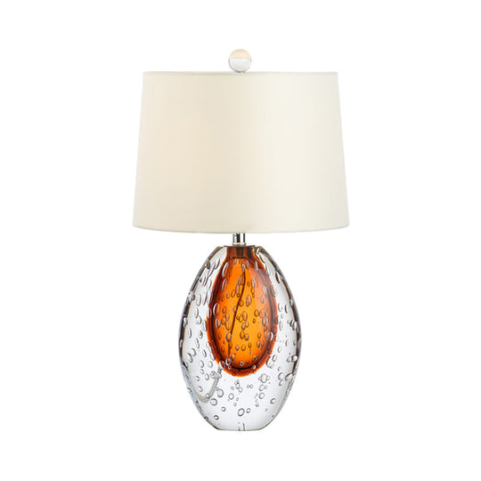Oval Desk Lamp With Clear Bubble Glass Ideal For Bedroom Or Night Table Modern Design In White