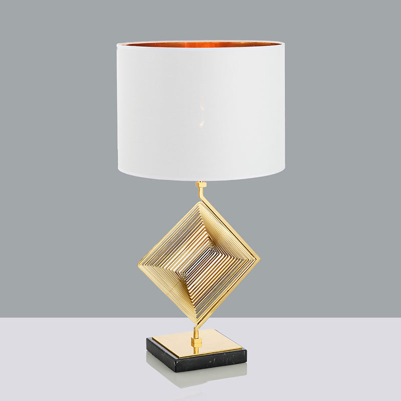Modern Gold Metal Pyramid Bedside Lamp With White Fabric Shade