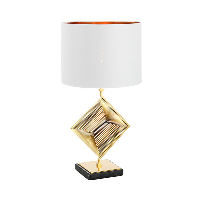 Modern Gold Metal Pyramid Bedside Lamp With White Fabric Shade