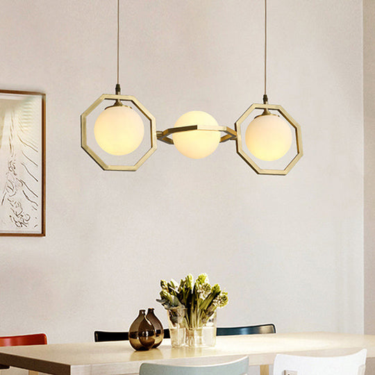 Modern White Frosted Glass Orb Island Light With Gold Octagon Frame - 3-Light Ceiling Pendant Lamp