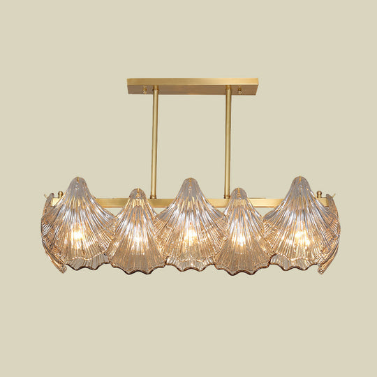 Contemporary Amber Crystal Pendant Light With Brass Island Lighting - 8 Lights Linear Metal Arm
