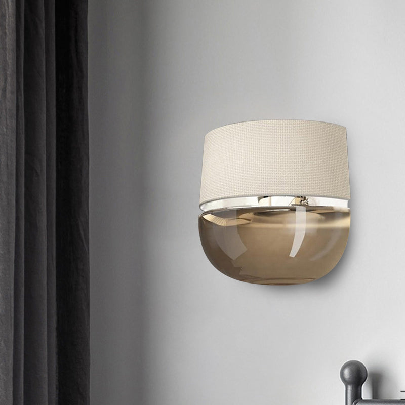 Modern Arched Wall Sconce In White With Grid Pattern Fabric And Tan Glass Bottom