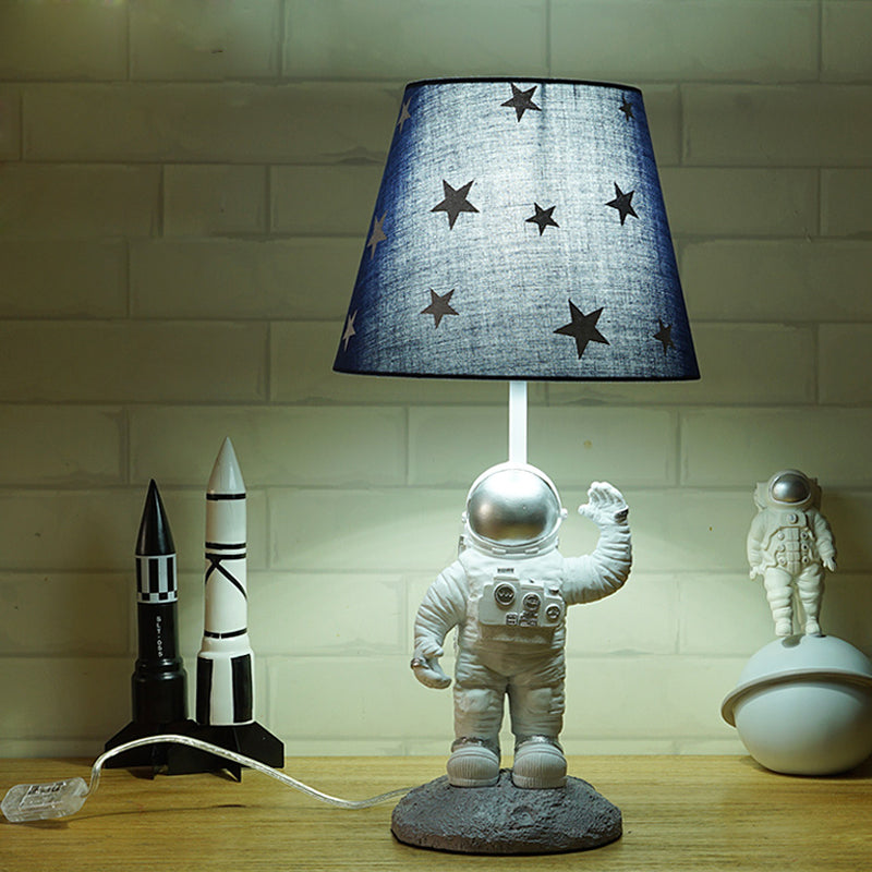 Blue Empire Shade Night Lamp - Kids Star Patterned Fabric Table Lighting With Carved Spaceman Base