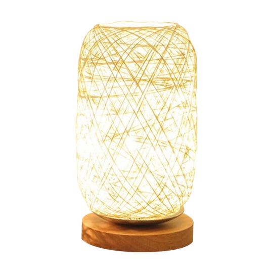 Modern Asian Bamboo Rattan Capsule Night Table Light - 1-Light Beige/Coffee Lamp