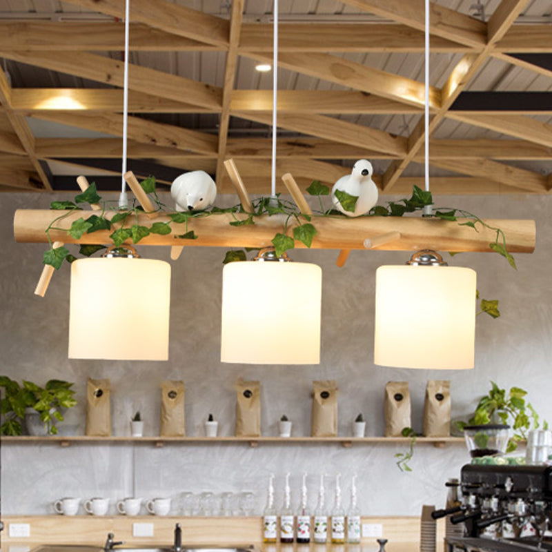 Industrial 3-Light Hanging Pendant For Coffee Shop With Milky Glass Cylinder Wooden Stick And Bird