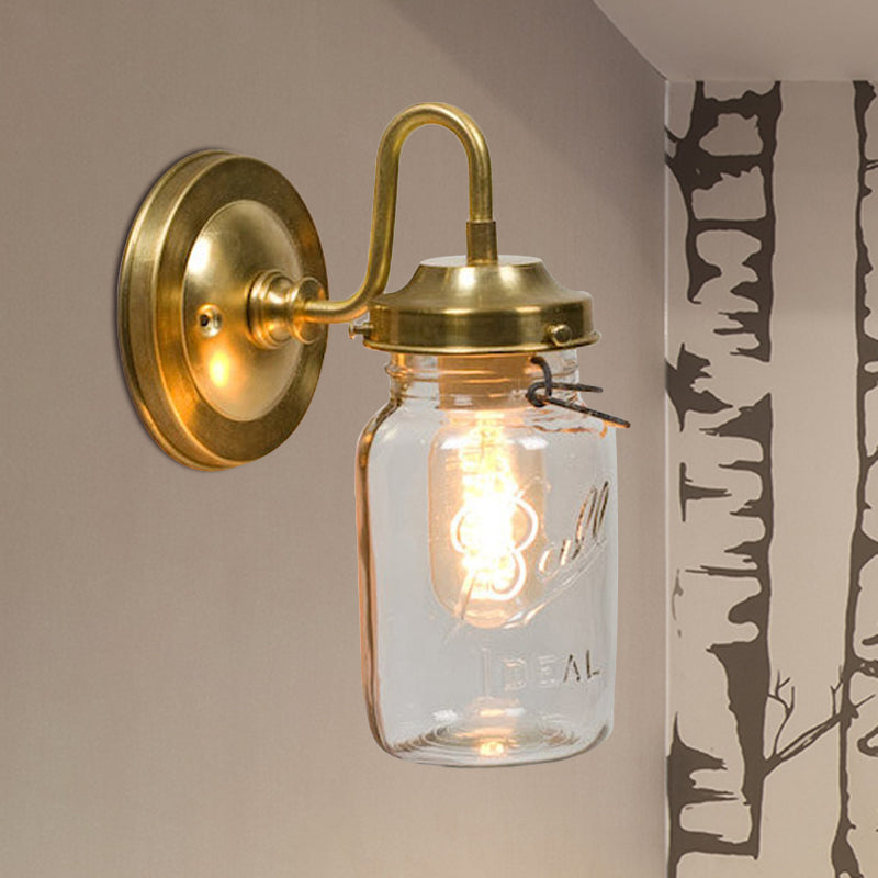 Industrial Clear Glass Wall Sconce With Brass Finish And Letter Detail