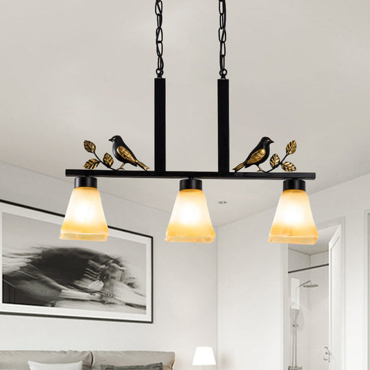 Black Island Pendant With 3 Tan Glass Shades And Bird Deco - Traditional Dining Room Ceiling Light