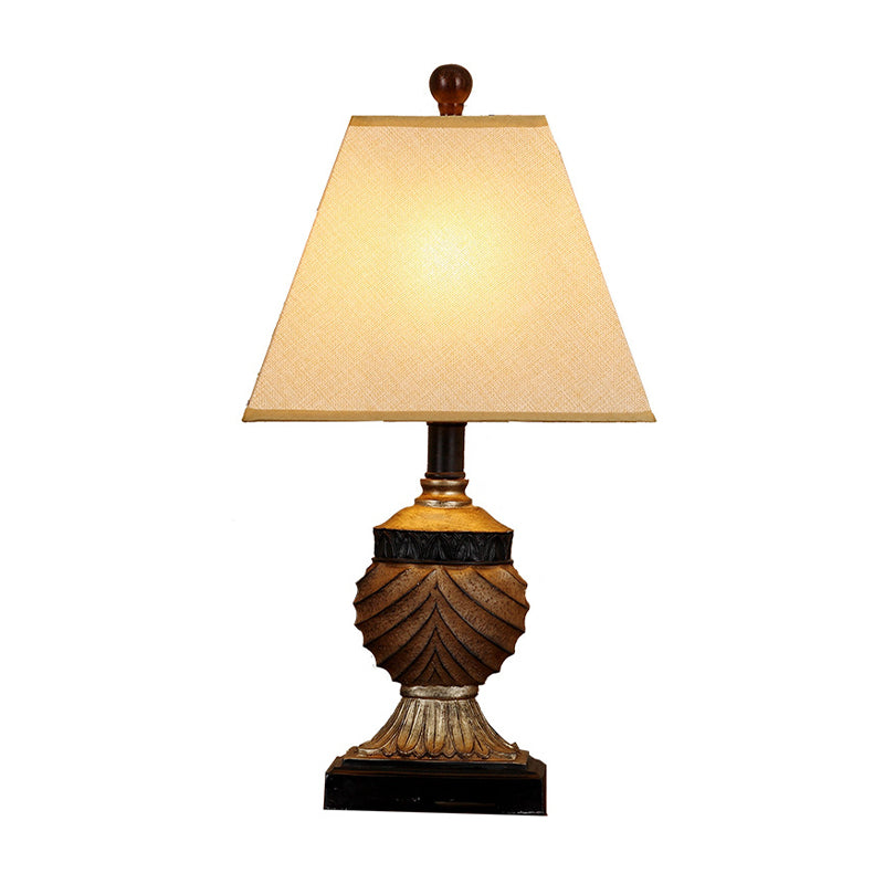 Rustic Pinecone Table Lamp With Resin Base And Trapezoid Fabric Shade