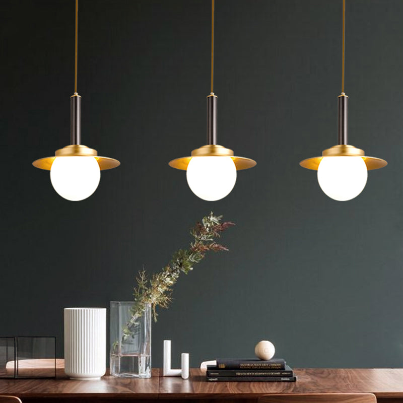 Post-Modern Metal Cap Pendant Light With Brass Head And Glass Shade