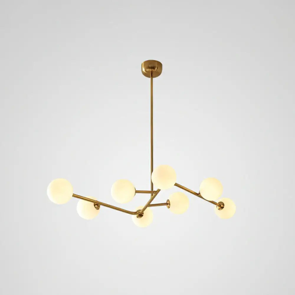 8-Light Brass Finish Molecular Chandelier With Glass Ball Shades For Simple Yet Elegant Suspension