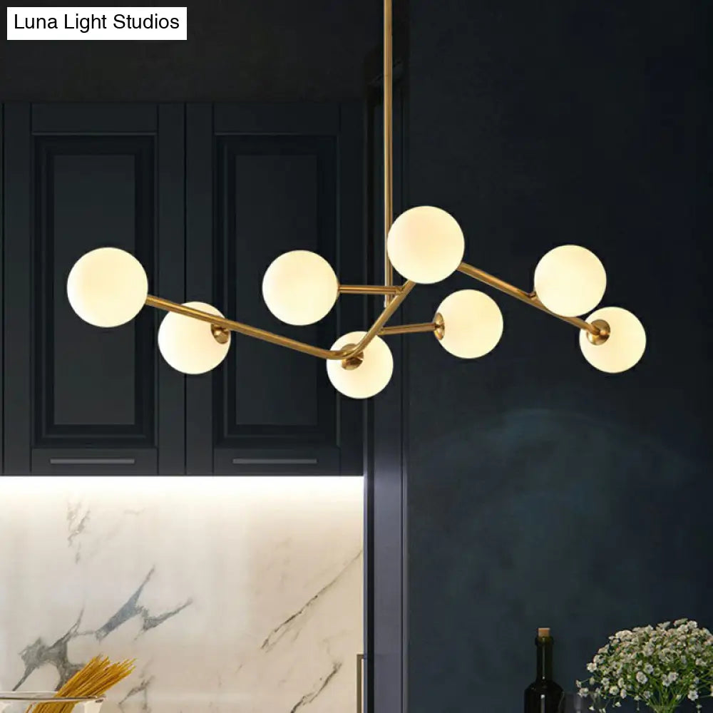 8-Light Brass Finish Molecular Chandelier With Glass Ball Shades For Simple Yet Elegant Suspension