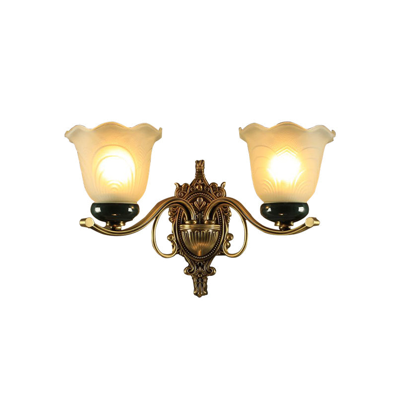 Traditional Brass Floral Wall Lamp With Frosted Glass And Carved Backplate