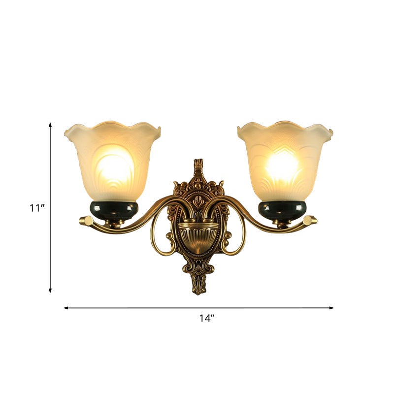 Traditional Brass Floral Wall Lamp With Frosted Glass And Carved Backplate