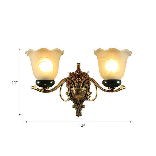 Traditional Brass Floral Wall Lamp With Frosted Glass And Carved Backplate