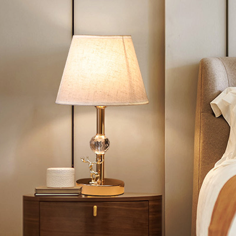 Minimalist Gold Cone Table Lamp With Fabric Shade And Crystal Deer Decoration