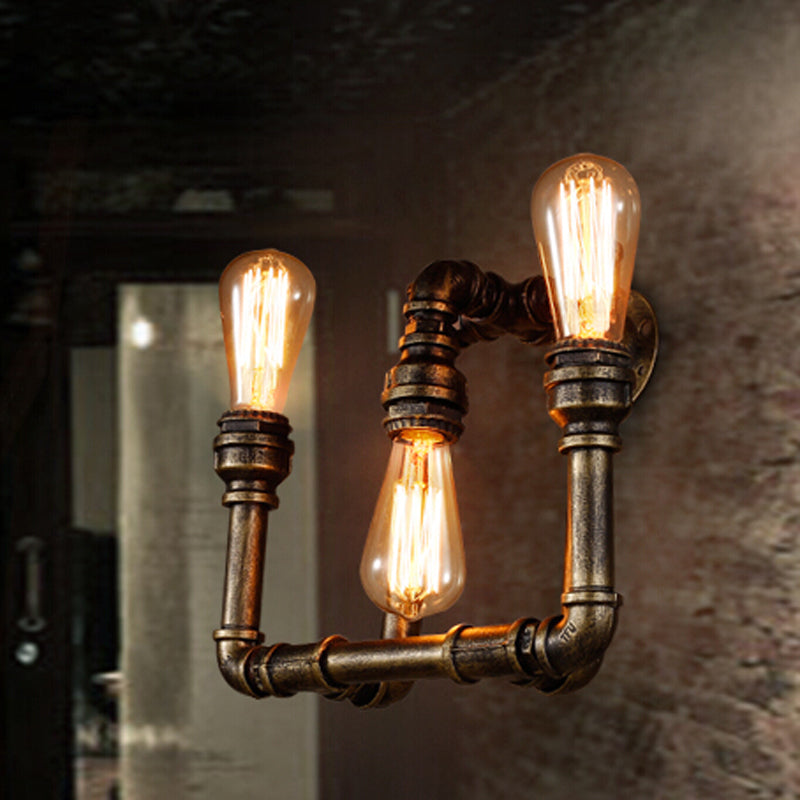 3-Head Industrial Sconce With Wrought Iron Pipe Design In Aged Brass For Hallway Antique
