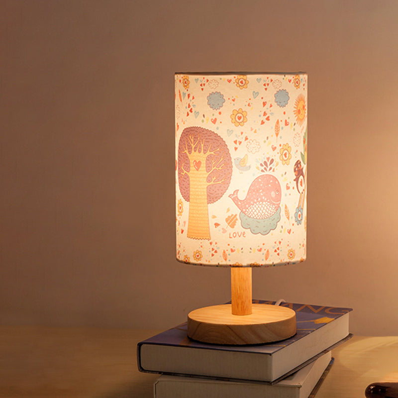 Kids Wood Cylinder Nightstand Lamp With Tree And Flower Pattern - Fabric Shade