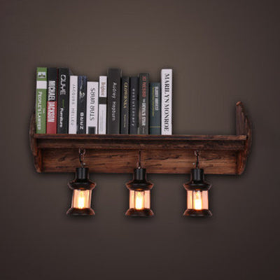 Coastal Style Black Lantern Sconce Light Fixture With Clear Glass And Wooden Bookshelf Wood