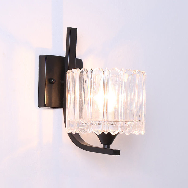 Post-Modern Black Metal Wall Mount Light With Clear Crystal Shade - Trapezoid/Flower/Drum Design