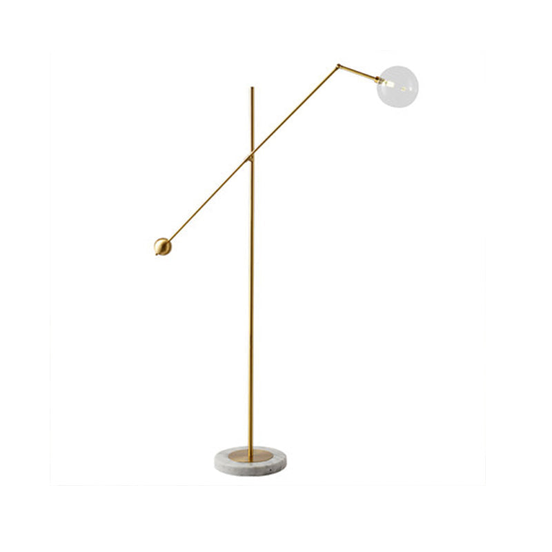 Modernist Gold Metal Balance Arm Task Floor Lamp With Orb Design Single Bulb Standing Light For
