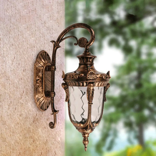 Acorn Glass Wall Sconce With Clear Water In Brass Finish