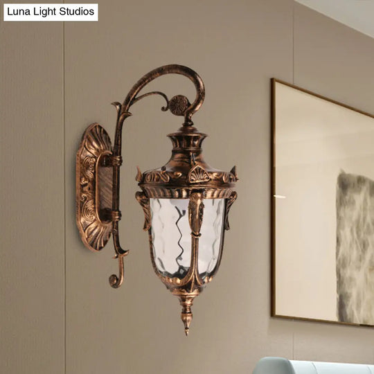 Acorn Glass Wall Sconce With Clear Water In Brass Finish